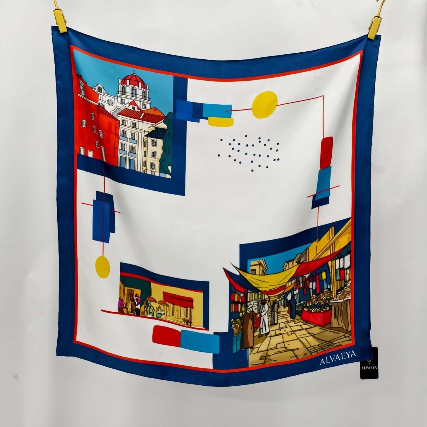 Ibn Batuta Silk Scarf design featuring vibrant market scenes and architectural elements from the Lineage Collection by Alvaeya.